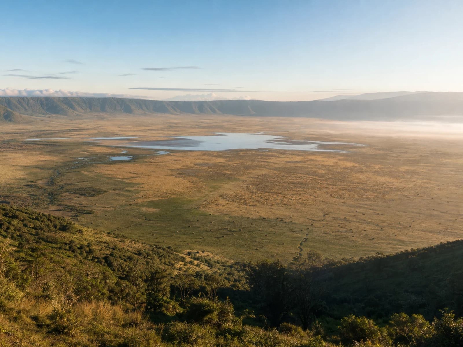 Safari Atlas generated view of Ngorongoro Crater using verified context: savanna, mountain, lake.